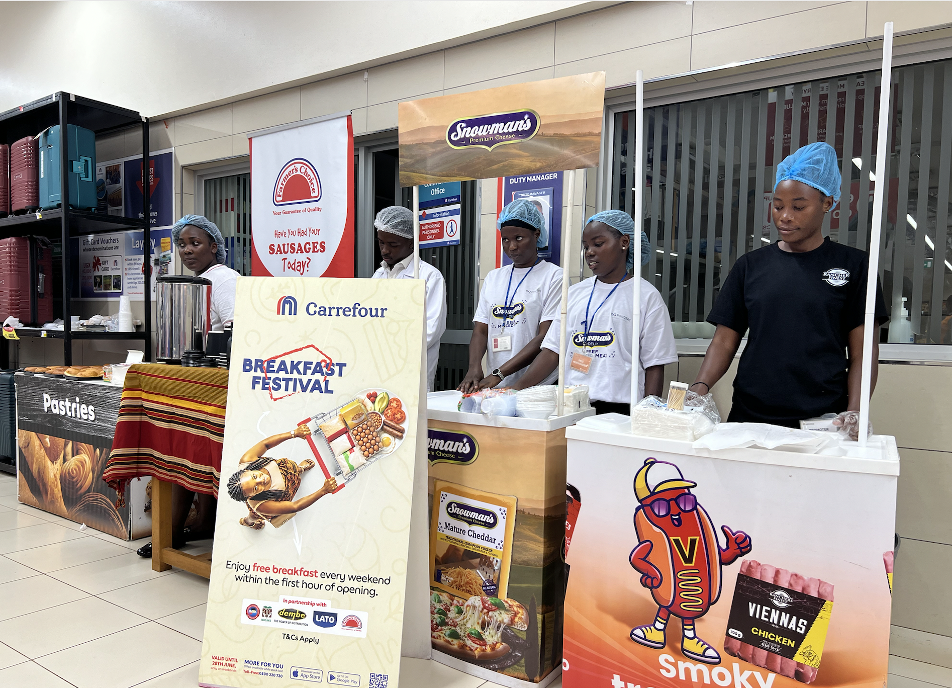 Carrefour staff instore ready to serve the customers